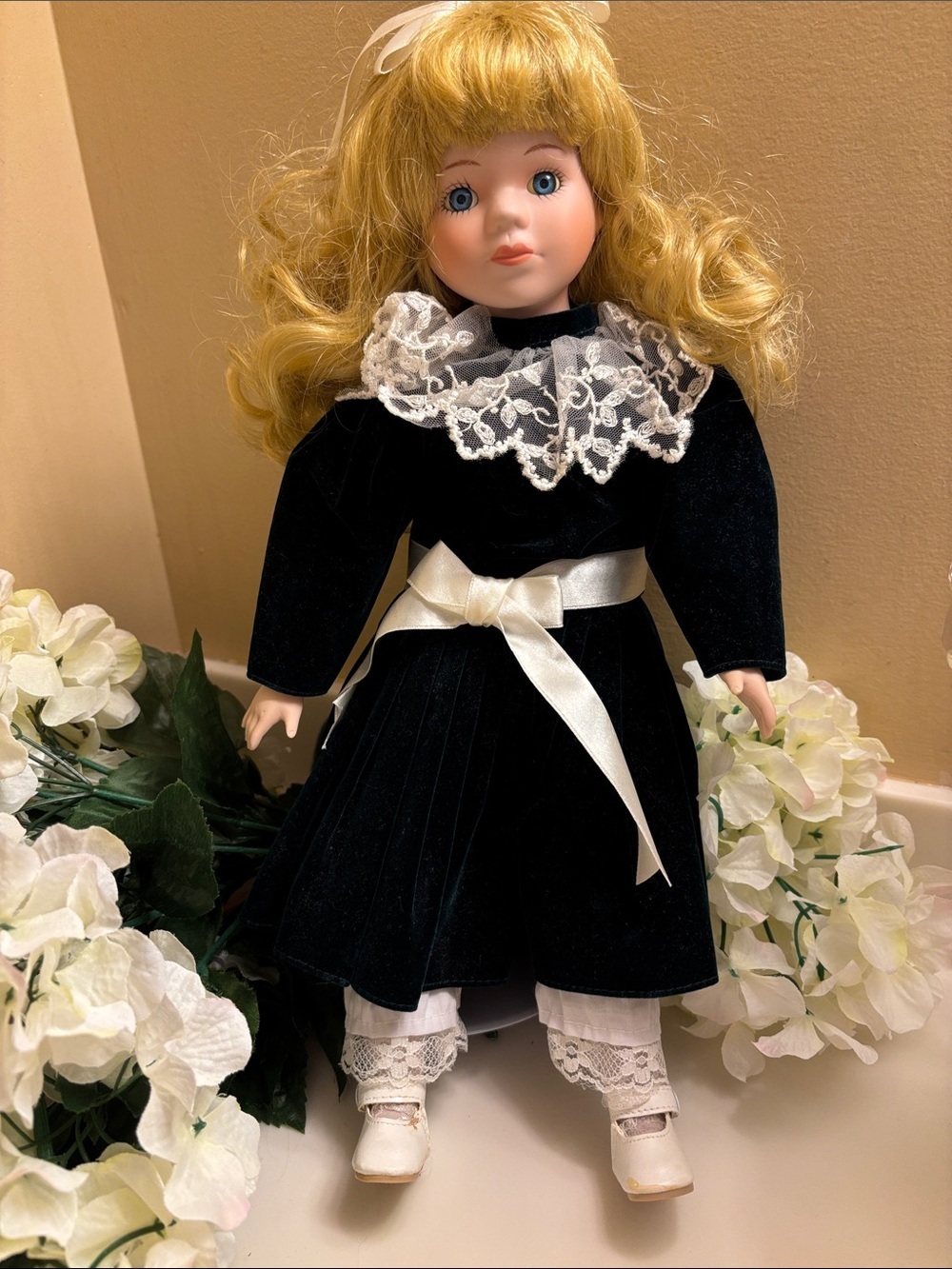 Classic Porcelain Doll in Black Dress with White Lace Trim